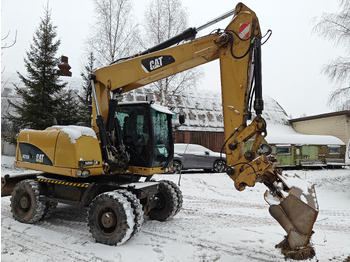 Колёсный экскаватор CATERPILLAR M315D