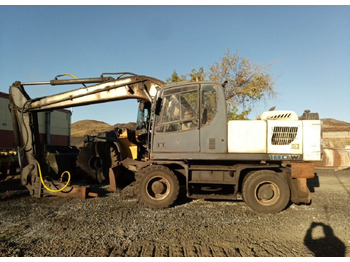 Колёсный экскаватор TEREX