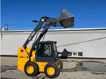 Мини-погрузчик с бортовым поворотом