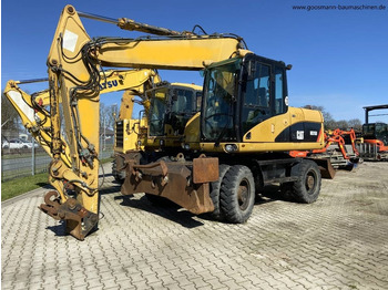 Колёсный экскаватор CATERPILLAR M315D