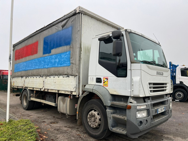 Iveco STRALIS 270 - 190S27 4x2 BACHER RIDELLES / BOX + ALU SIDE BOARDS - 6m90 - MANUAL ZF - EURO 3 - AIR SUSPENSION - Тентованный грузовик: фото 1 Iveco STRALIS 270 - 190S27 4x2 BACHER RIDELLES / BOX + ALU SIDE BOARDS - 6m90 - MANUAL ZF - EURO 3 - AIR SUSPENSION - Тентованный грузовик: фото 1