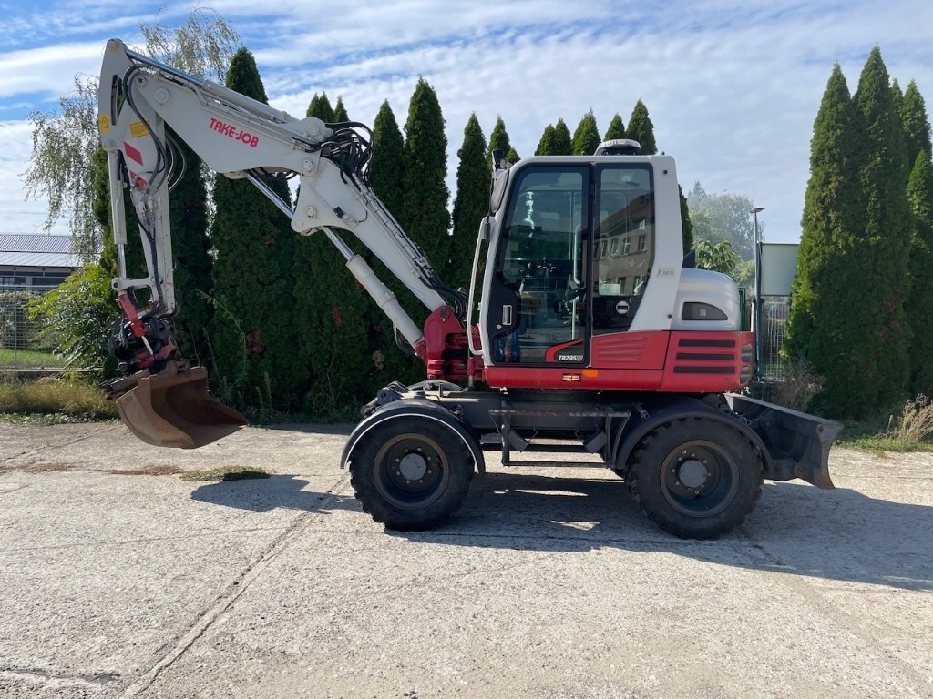 Takeuchi TB 295 W + ROTOTILT + 3x buckets - Колёсный экскаватор: фото 1 Takeuchi TB 295 W + ROTOTILT + 3x buckets - Колёсный экскаватор: фото 1