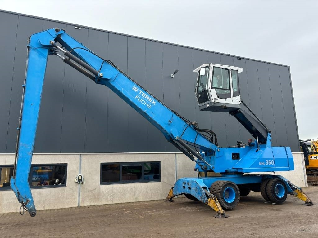 Fuchs MHL 350 - Перегружатель: фото 1 Fuchs MHL 350 - Перегружатель: фото 1