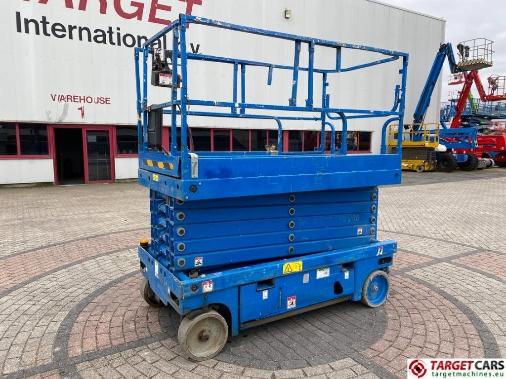 Haulotte Compact 14 Electric Scissor Work Lift 1385cm - Ножничный подъемник: фото 1 Haulotte Compact 14 Electric Scissor Work Lift 1385cm - Ножничный подъемник: фото 1