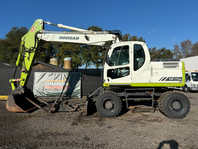 Doosan DX170 ( DX140 DX160 ) triple, quick hitch NL mach - Колёсный экскаватор: фото 1 Doosan DX170 ( DX140 DX160 ) triple, quick hitch NL mach - Колёсный экскаватор: фото 1
