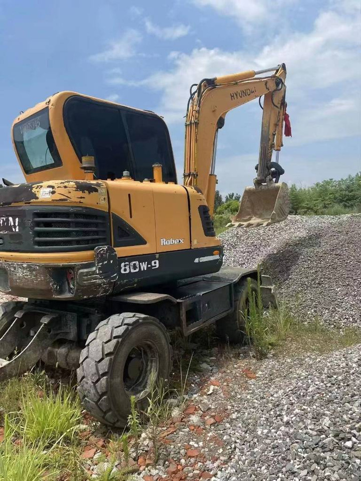 Hyundai 60W-9 - Колёсный экскаватор: фото 1 Hyundai 60W-9 - Колёсный экскаватор: фото 1