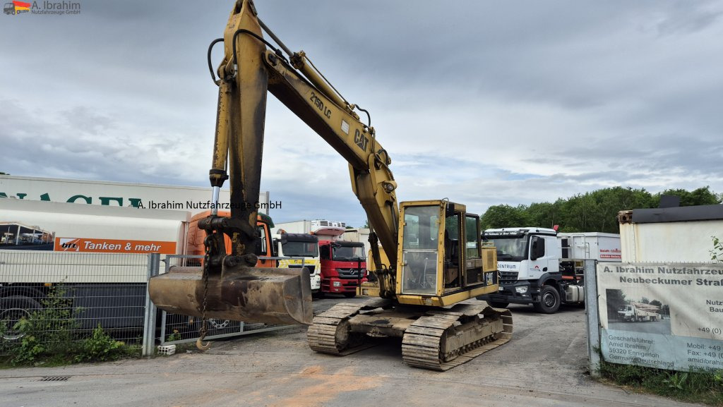 CAT 215 DLC Zustand normal, Hydraulik trocken - Гусеничный экскаватор: фото 1 CAT 215 DLC Zustand normal, Hydraulik trocken - Гусеничный экскаватор: фото 1