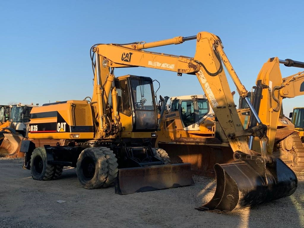 CAT M 315 - Колёсный экскаватор: фото 1 CAT M 315 - Колёсный экскаватор: фото 1