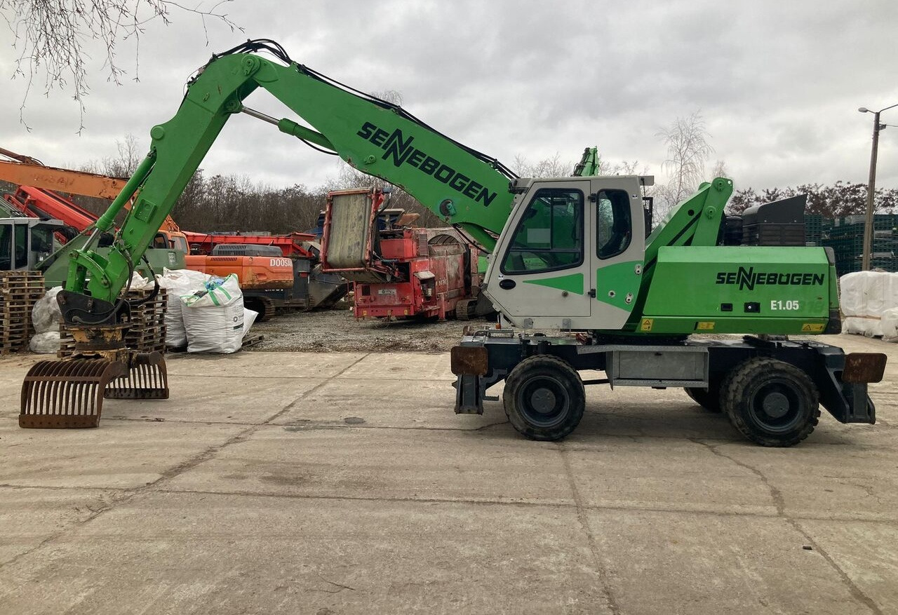 Sennebogen 818 M - Перегружатель: фото 1 Sennebogen 818 M - Перегружатель: фото 1