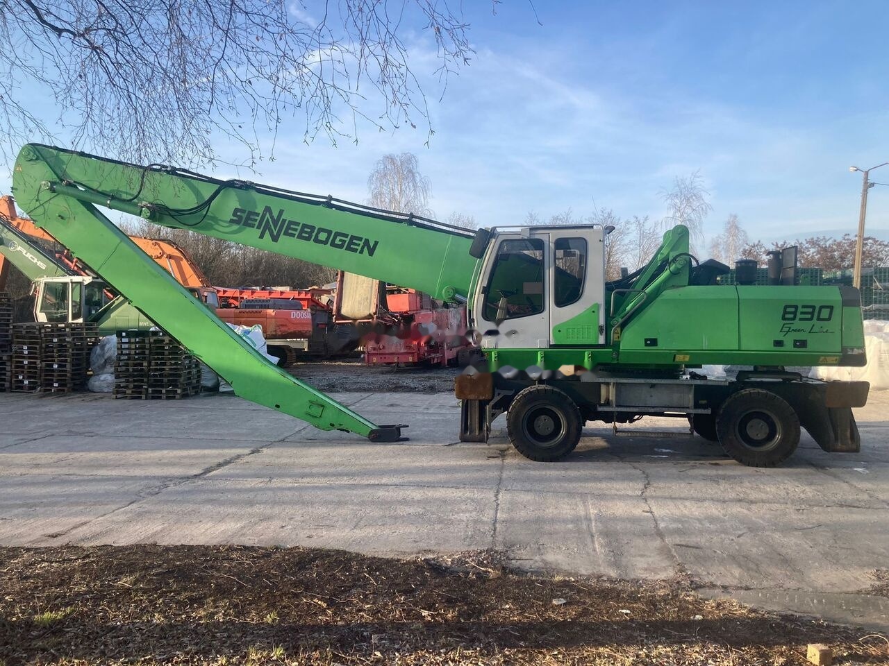 Sennebogen 830 M - Перегружатель: фото 1 Sennebogen 830 M - Перегружатель: фото 1