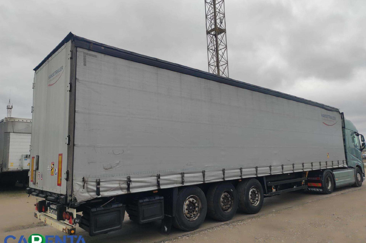 Schmitz SCS 24 - Тентованный полуприцеп: фото 1 Schmitz SCS 24 - Тентованный полуприцеп: фото 1