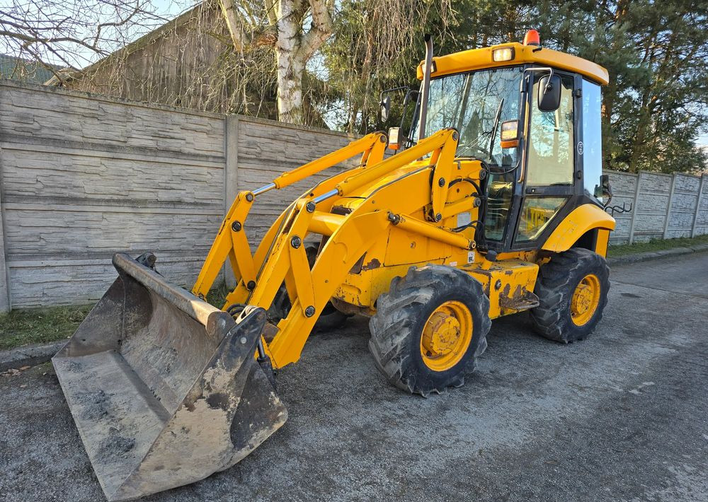 JCB - Колёсный погрузчик: фото 1 JCB - Колёсный погрузчик: фото 1