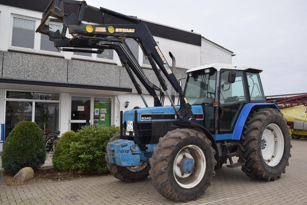 New Holland 8340 - Трактор: фото 1 New Holland 8340 - Трактор: фото 1