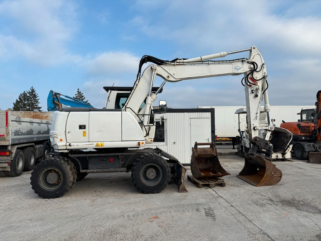 New Holland WE150 C - Колёсный экскаватор: фото 1 New Holland WE150 C - Колёсный экскаватор: фото 1