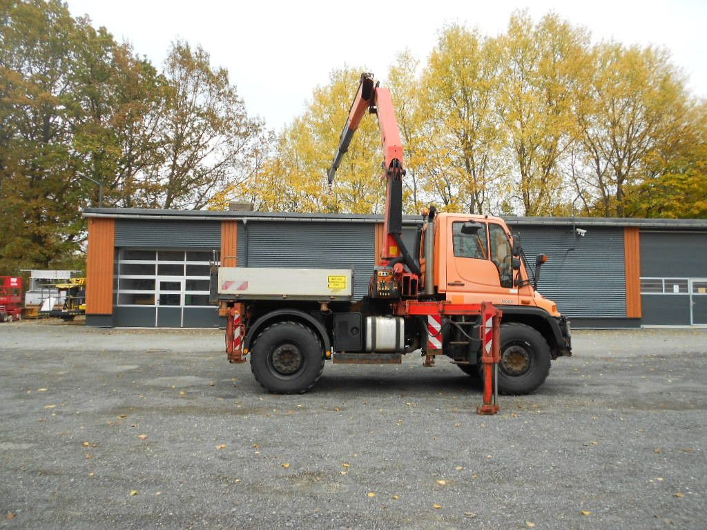Unimog U400 mit Kran Palfinger PK11502 - Грузовик бортовой/ Платформа, Автоманипулятор: фото 1 Unimog U400 mit Kran Palfinger PK11502 - Грузовик бортовой/ Платформа, Автоманипулятор: фото 1