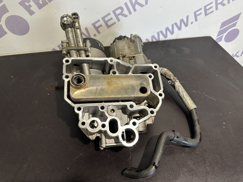 MAN oil filter housing with coolant - Двигатель и запчасти для Грузовиков: фото 1 MAN oil filter housing with coolant - Двигатель и запчасти для Грузовиков: фото 1