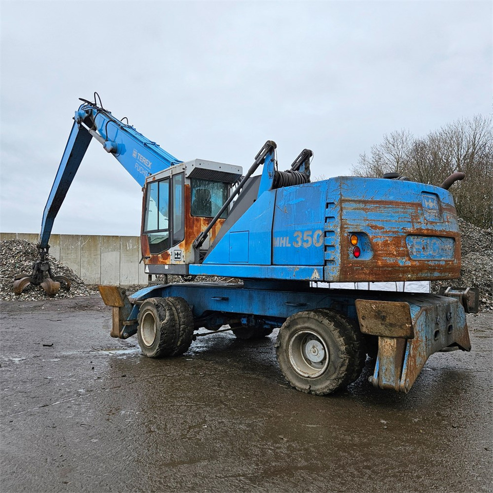 Fuchs MHL 350 D - Перегружатель: фото 1 Fuchs MHL 350 D - Перегружатель: фото 1